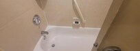 So, not only was this a tub/shower with curtain combo but the tub itself was narrow. Stepping it and standing I can see where this could be a hazard because your feet aren't flat.