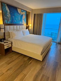 King size bed in oceanfront suite.