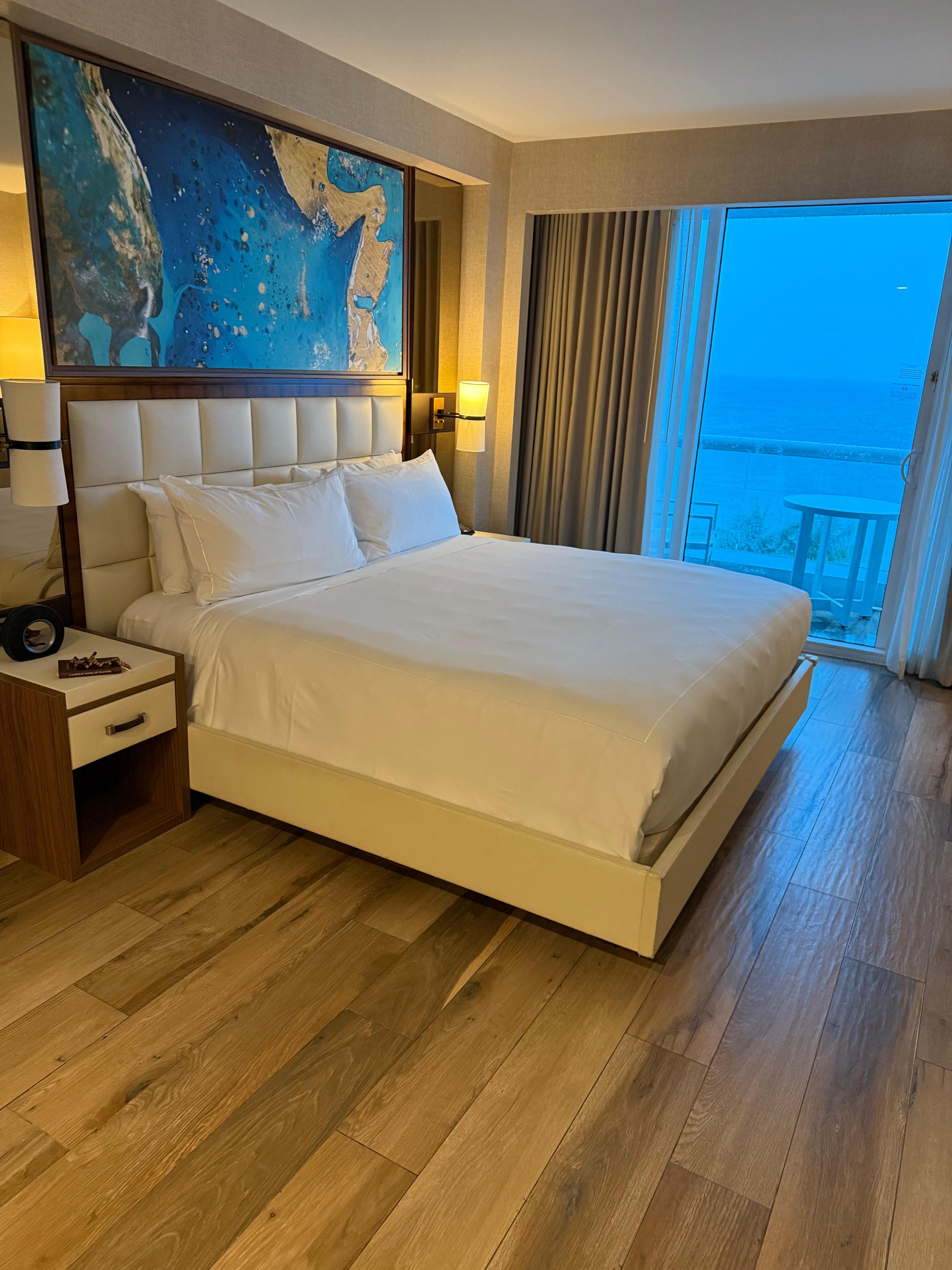 King size bed in oceanfront suite. 
