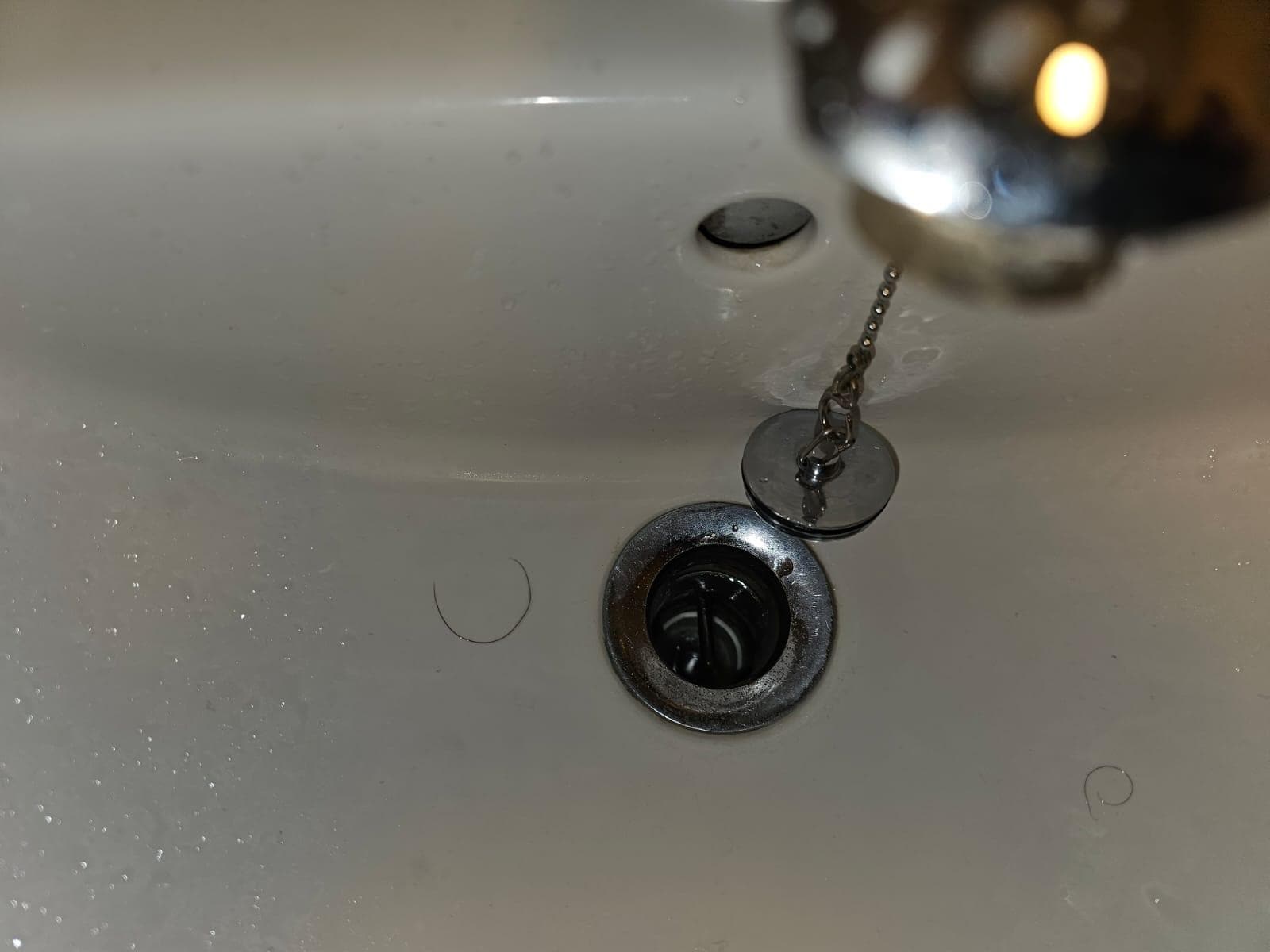 Plug hole in sink - original plug had fallen out and now there is no grille and tap leaked so when it splashed in bottom of waste hole it was very loud