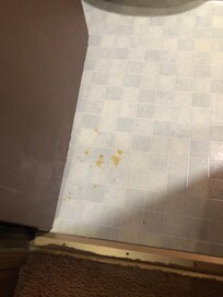Yellow spots on bathroom floor