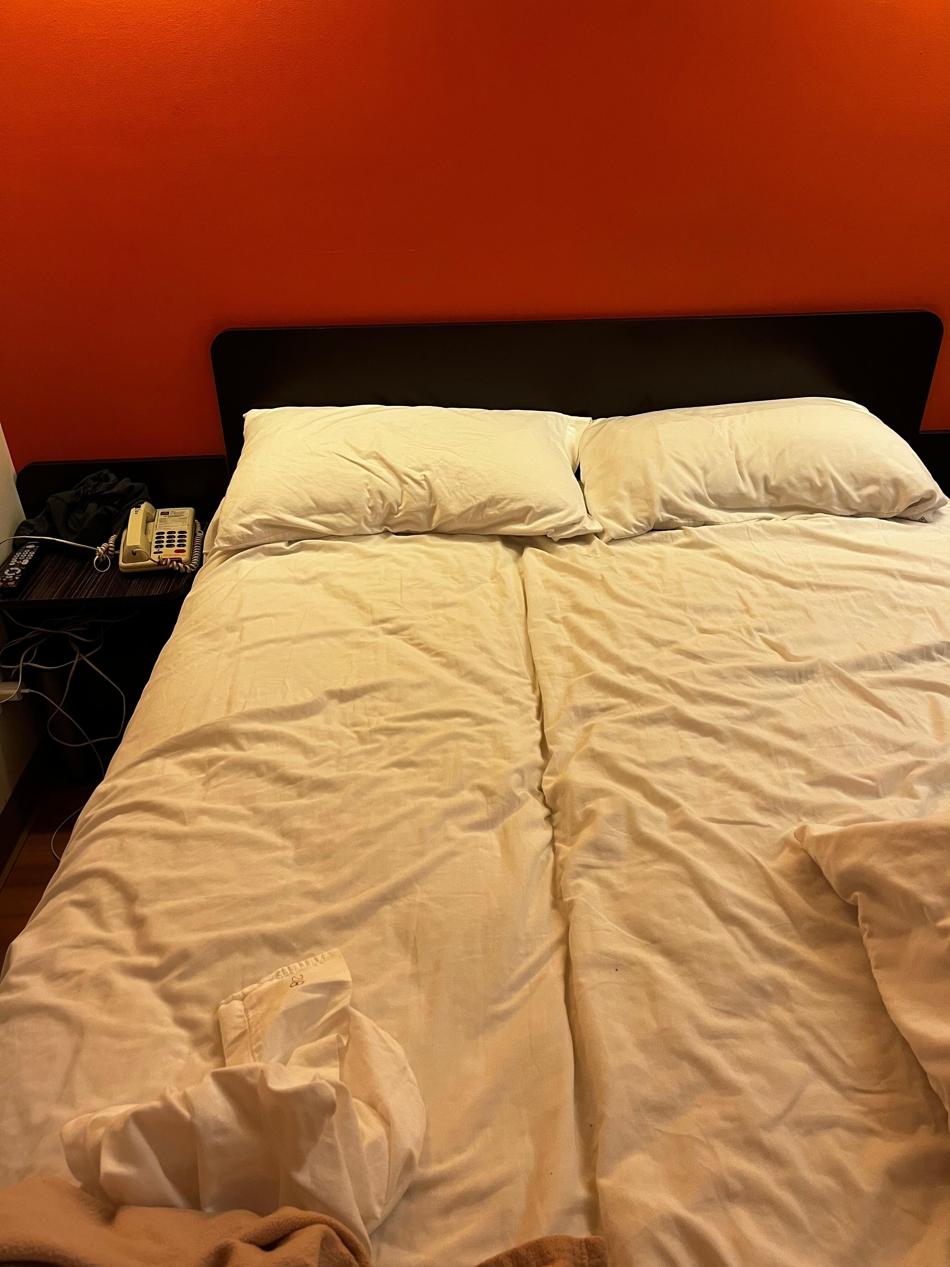 Bed with visible split down the middle 