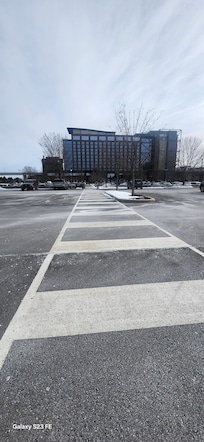 Walkway in the parking lot leading to hotel entrance