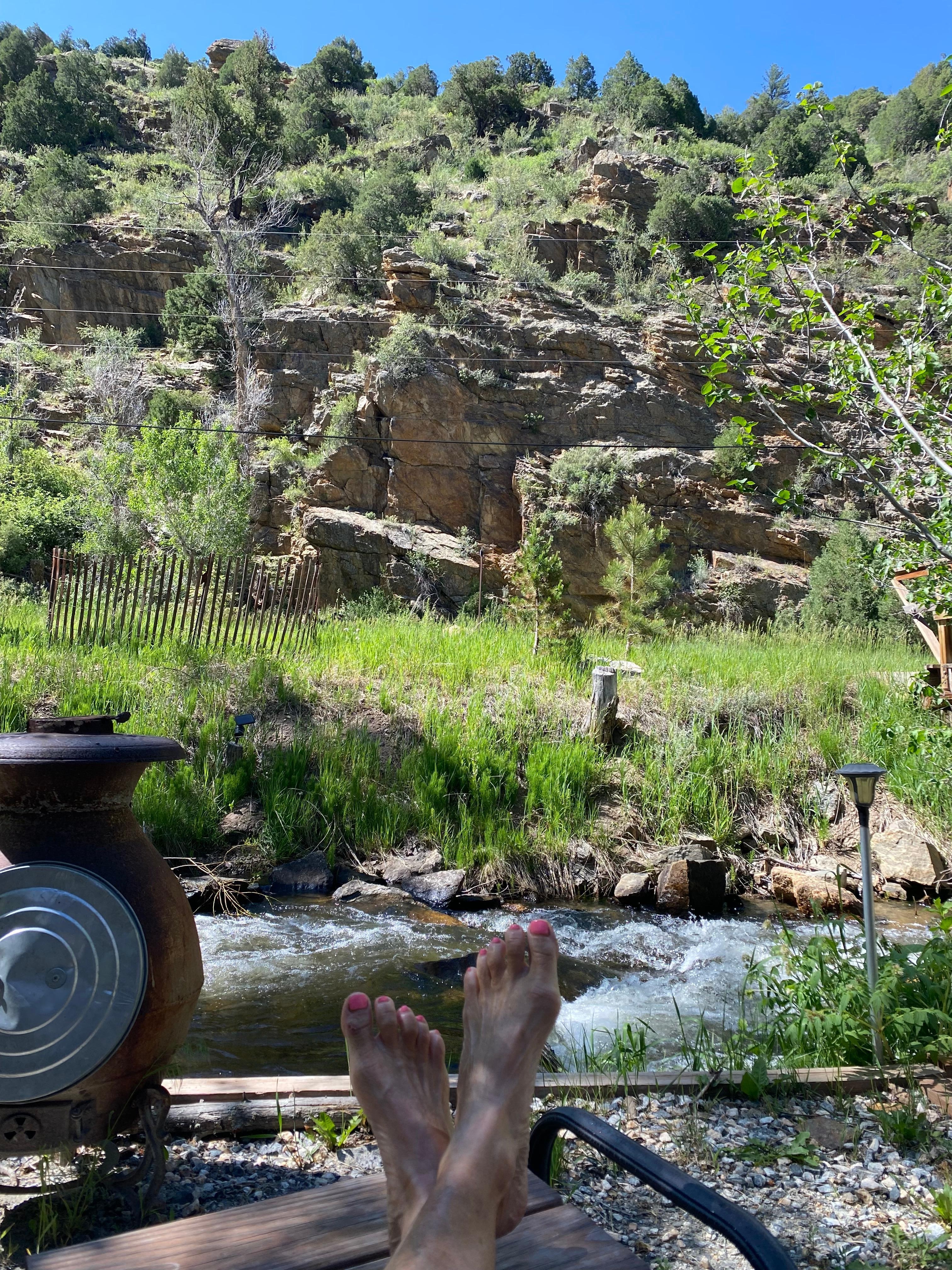 Relaxing out front by the creek. 