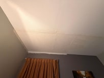 There had been an obvious leak repaired that was still in the process of being painted. The painting wasn’t done.