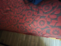 Holes in bed spread
