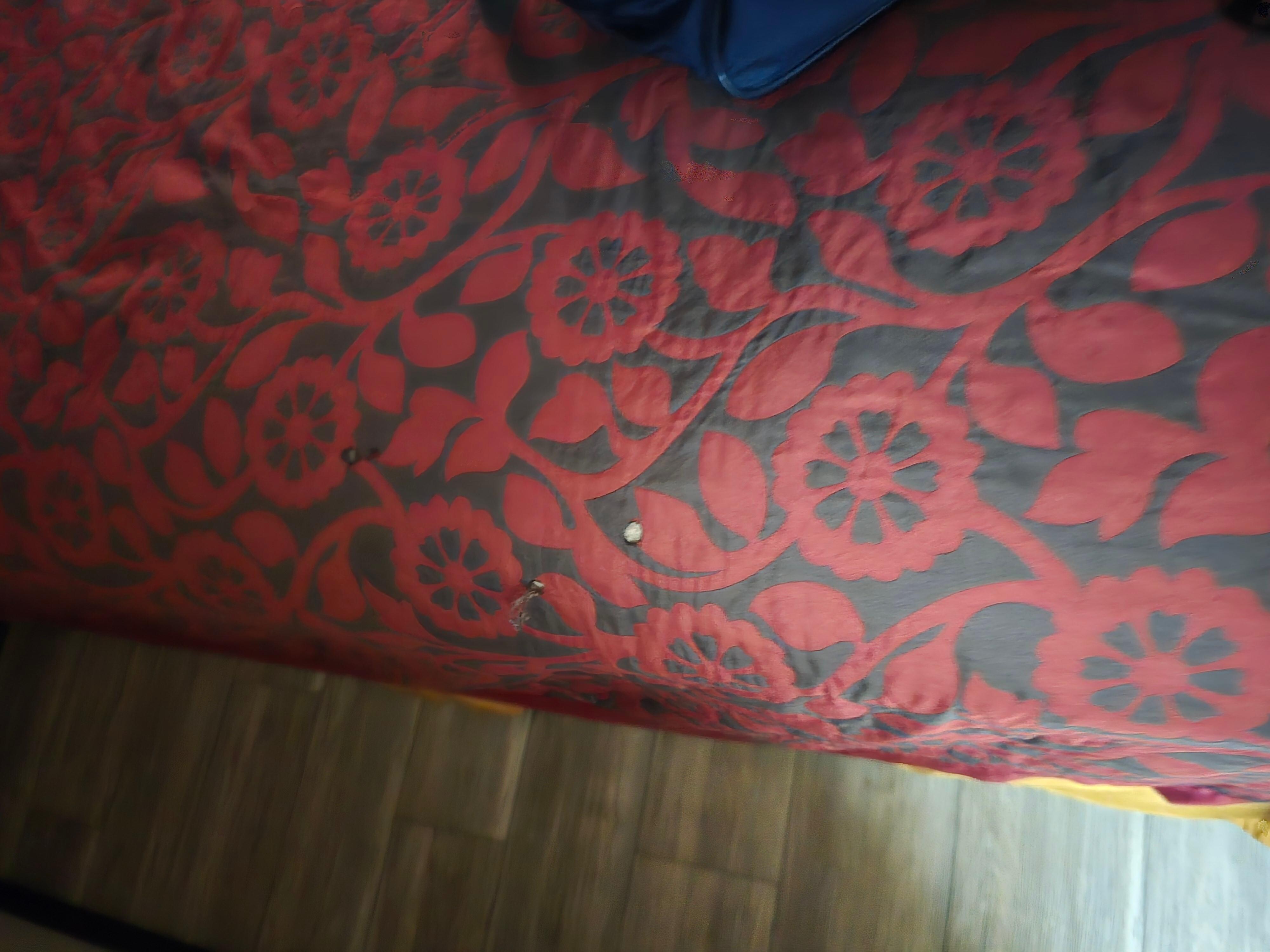 Holes in bed spread