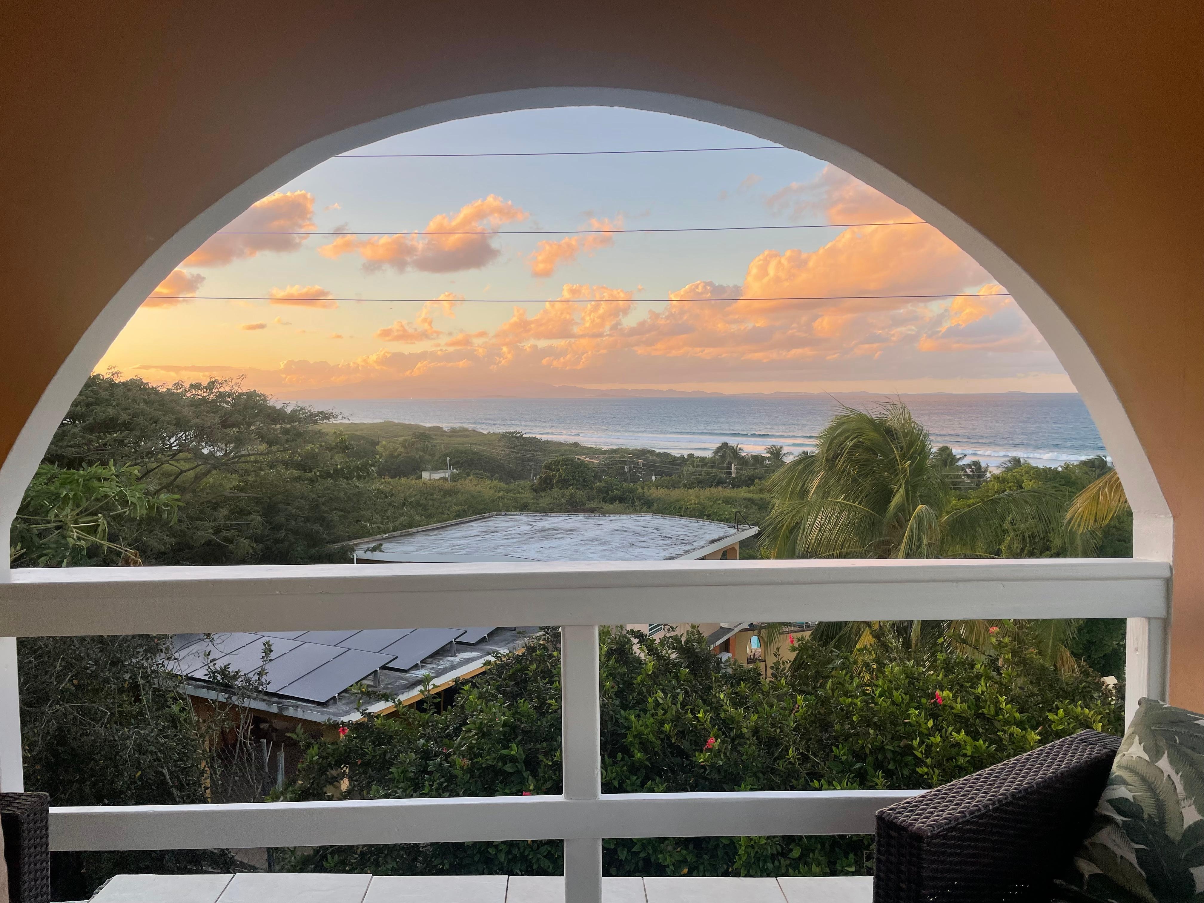 view from the top floor outside balcony seating area looking towards the main island