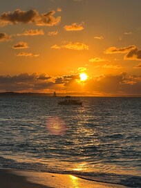 View of sunset from beach in front of Ocean Bay East