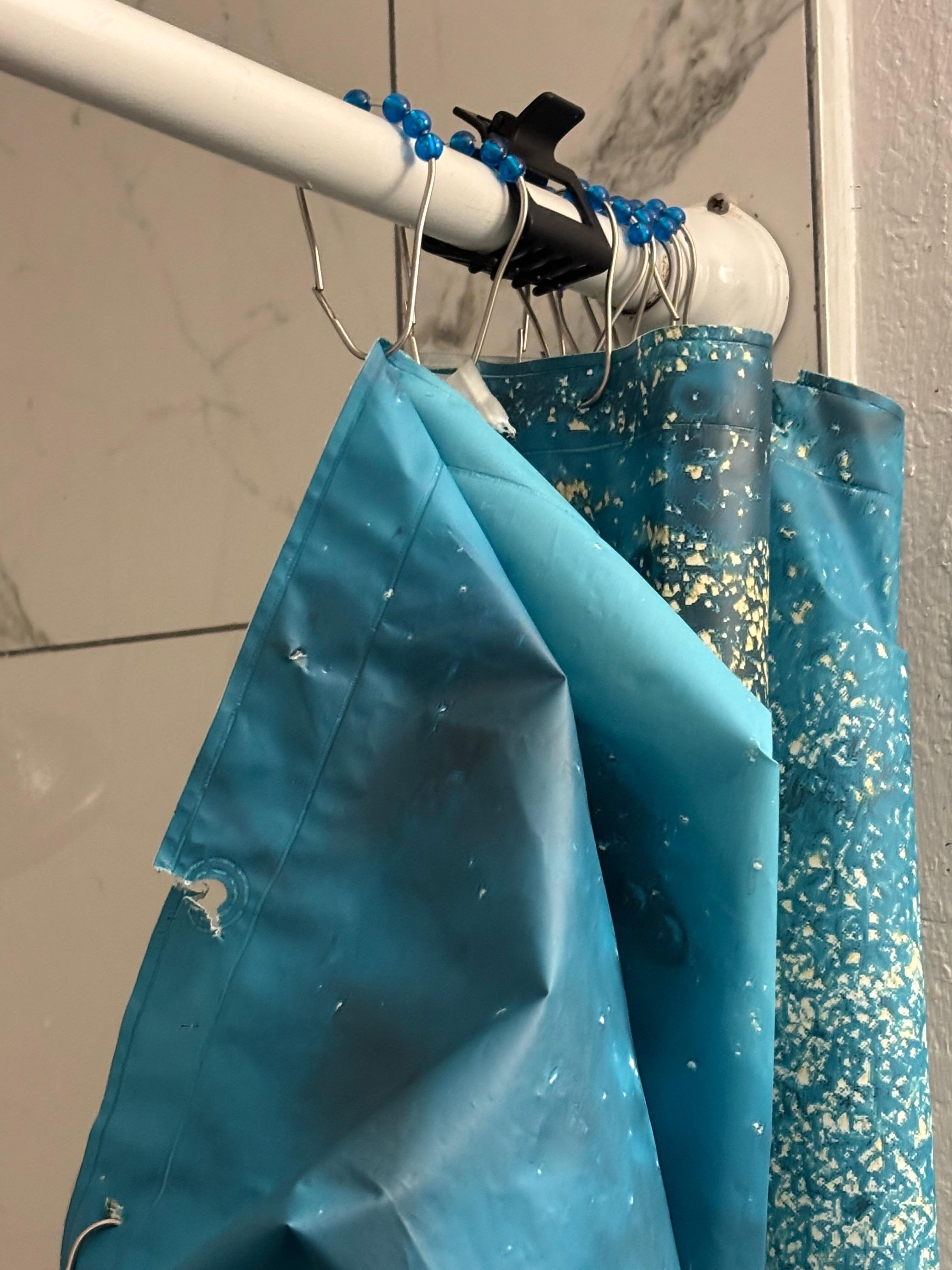 Shower had no hot water and water shot out the side of faucet. Shower curtain was a hot meds