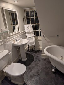 There is a shower to the left of the photo.