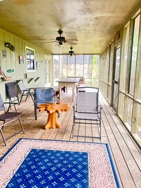 Screen in porch facing water.