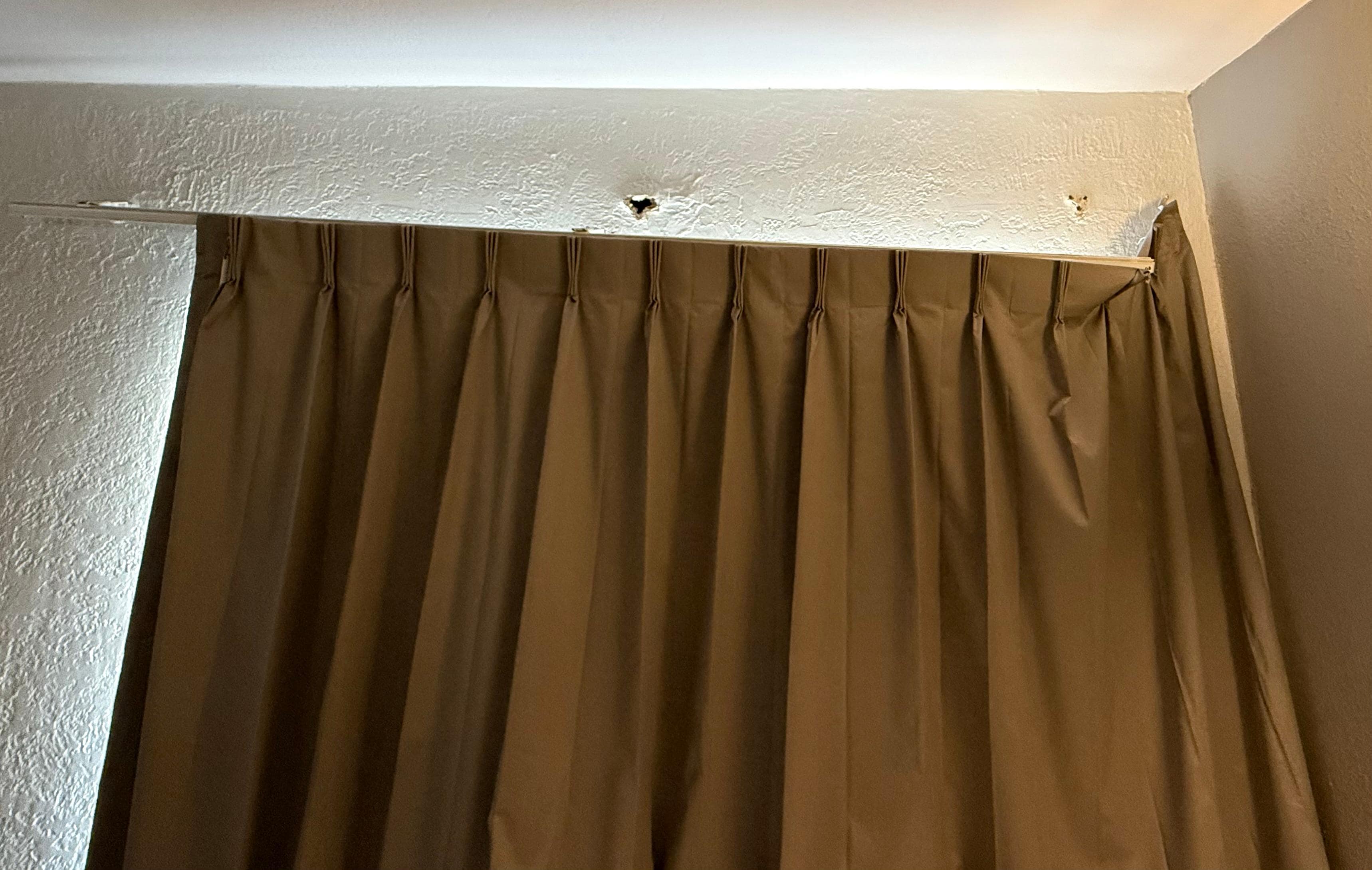 Drapery hanging off the wall 