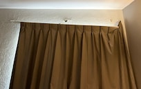 Drapery hanging off the wall