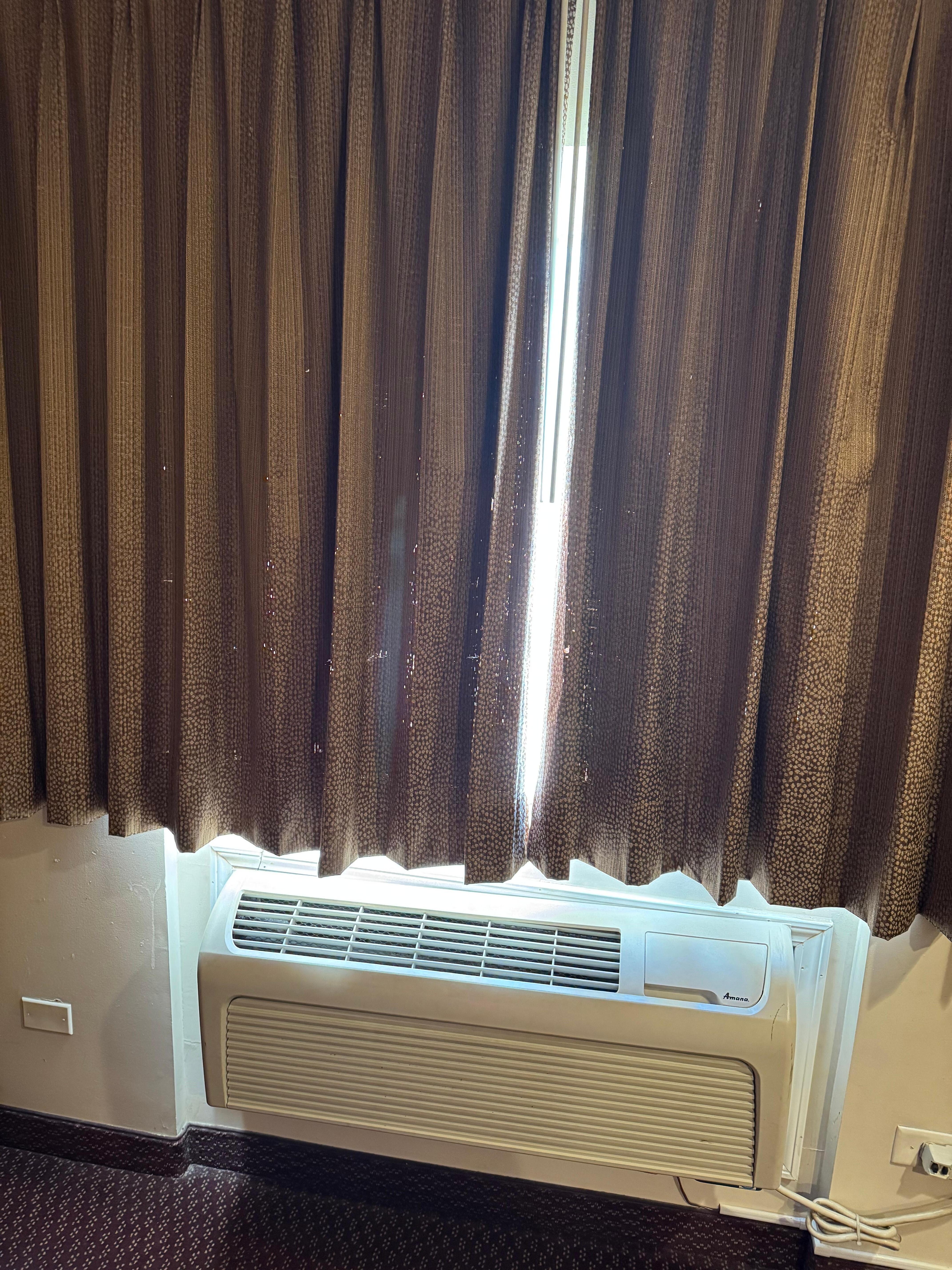 Daylight through the holes in the curtains