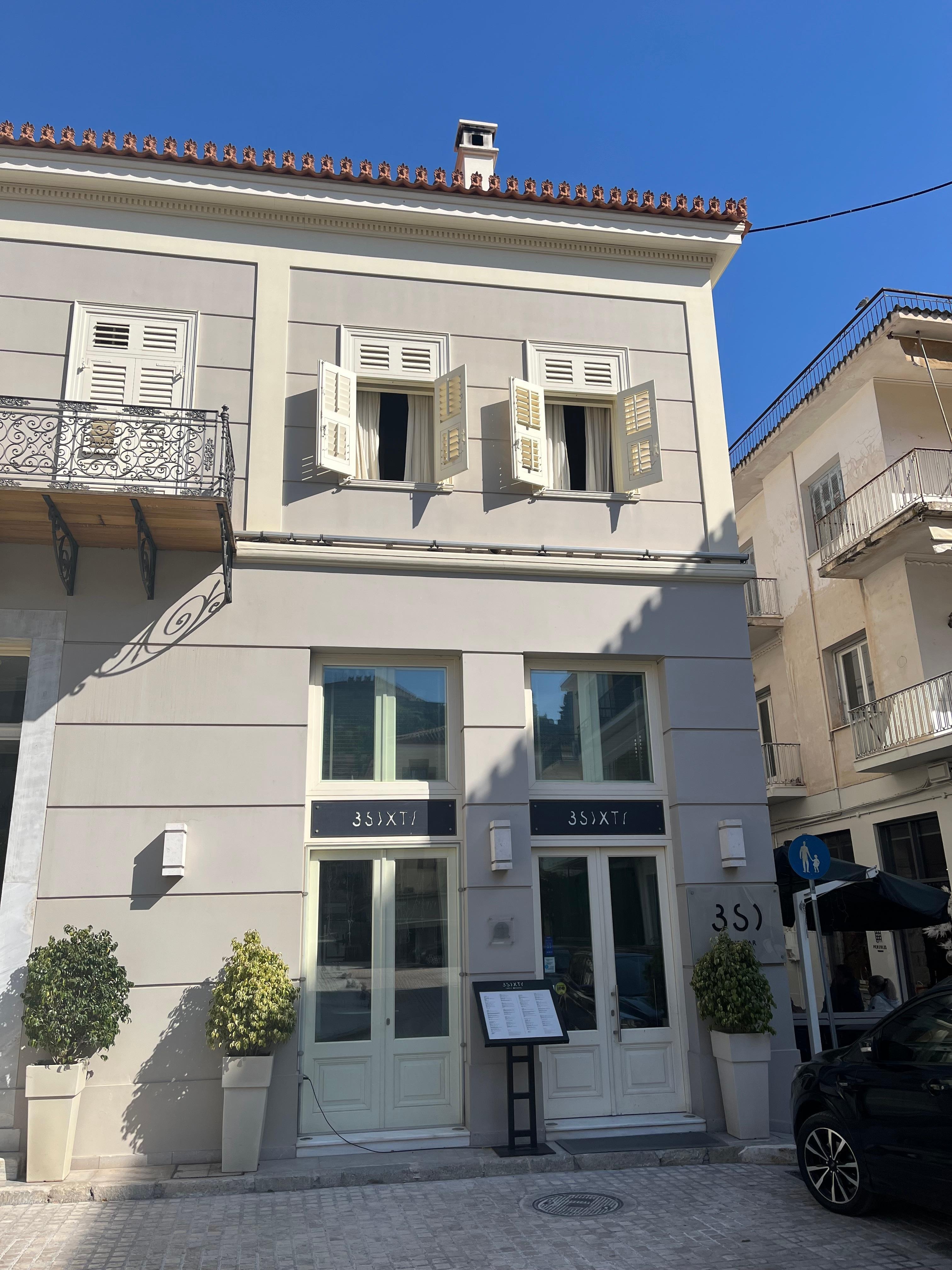 Front if the hotel looking up to our open shutters