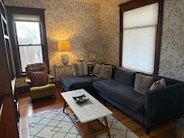 Comfy room with TV and plenty of blankets to settle on the sofa with a good book or watch a movie.