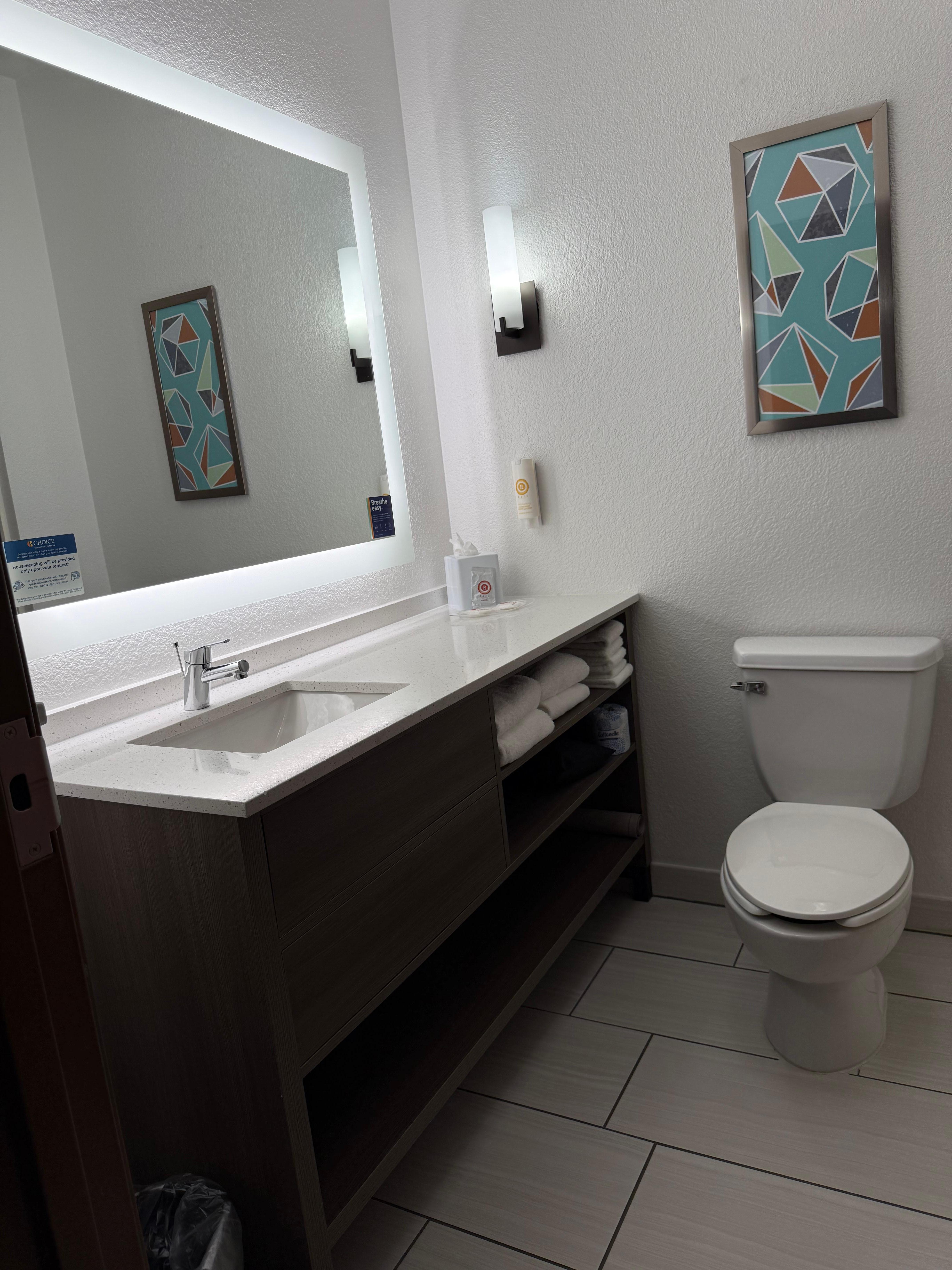 Bright and clean bathroom with eco friendly toiletries. 