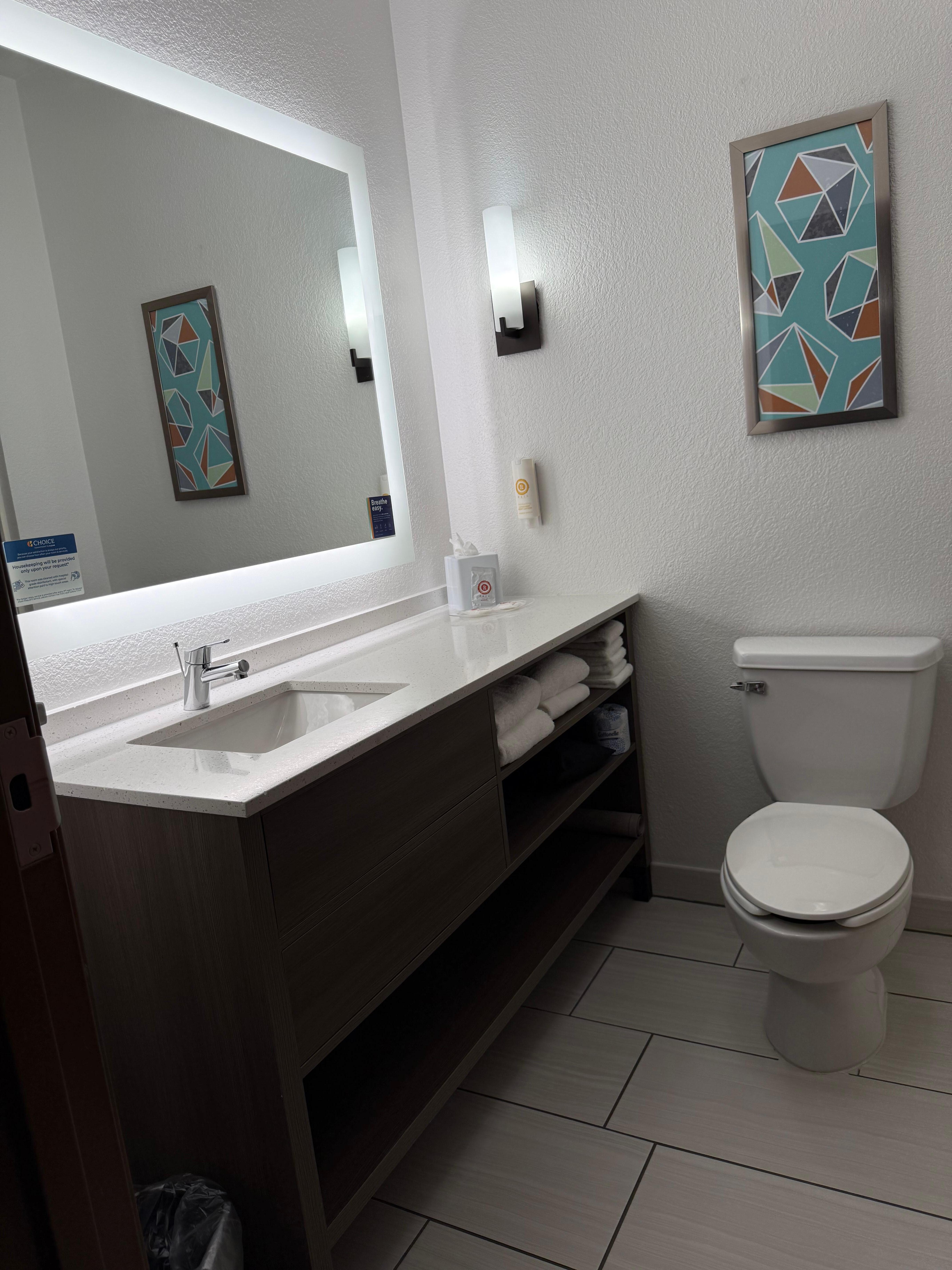 Bright and clean bathroom with eco friendly toiletries. 