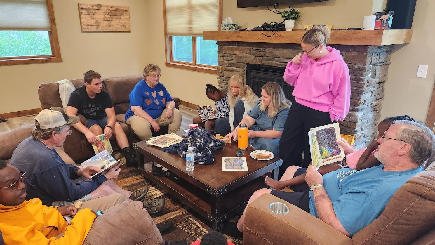 Hanging out with family in one of two spacious living room areas joined by expansive dining area with great views of the lake.