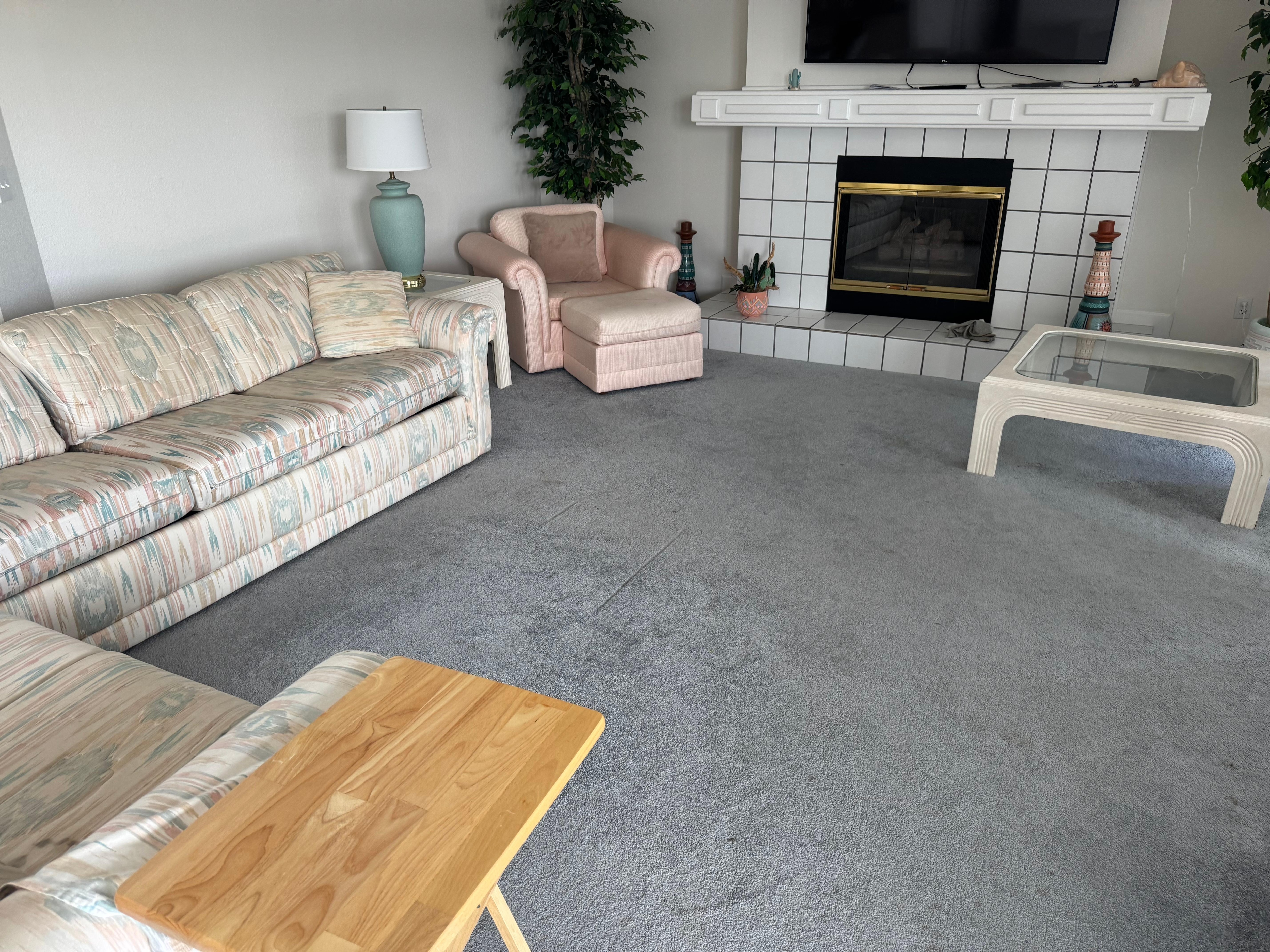 Just a wider shot of the living room not completed and debris all over the floors. 