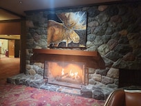 Extra chairs bear fireplace to relax