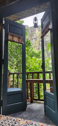 View from the room to the patio and river