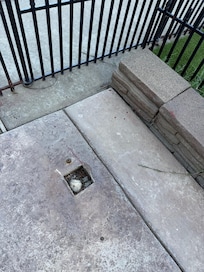 Loose bricks and holes where structure had been