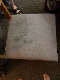Unknown stain on chair and floor