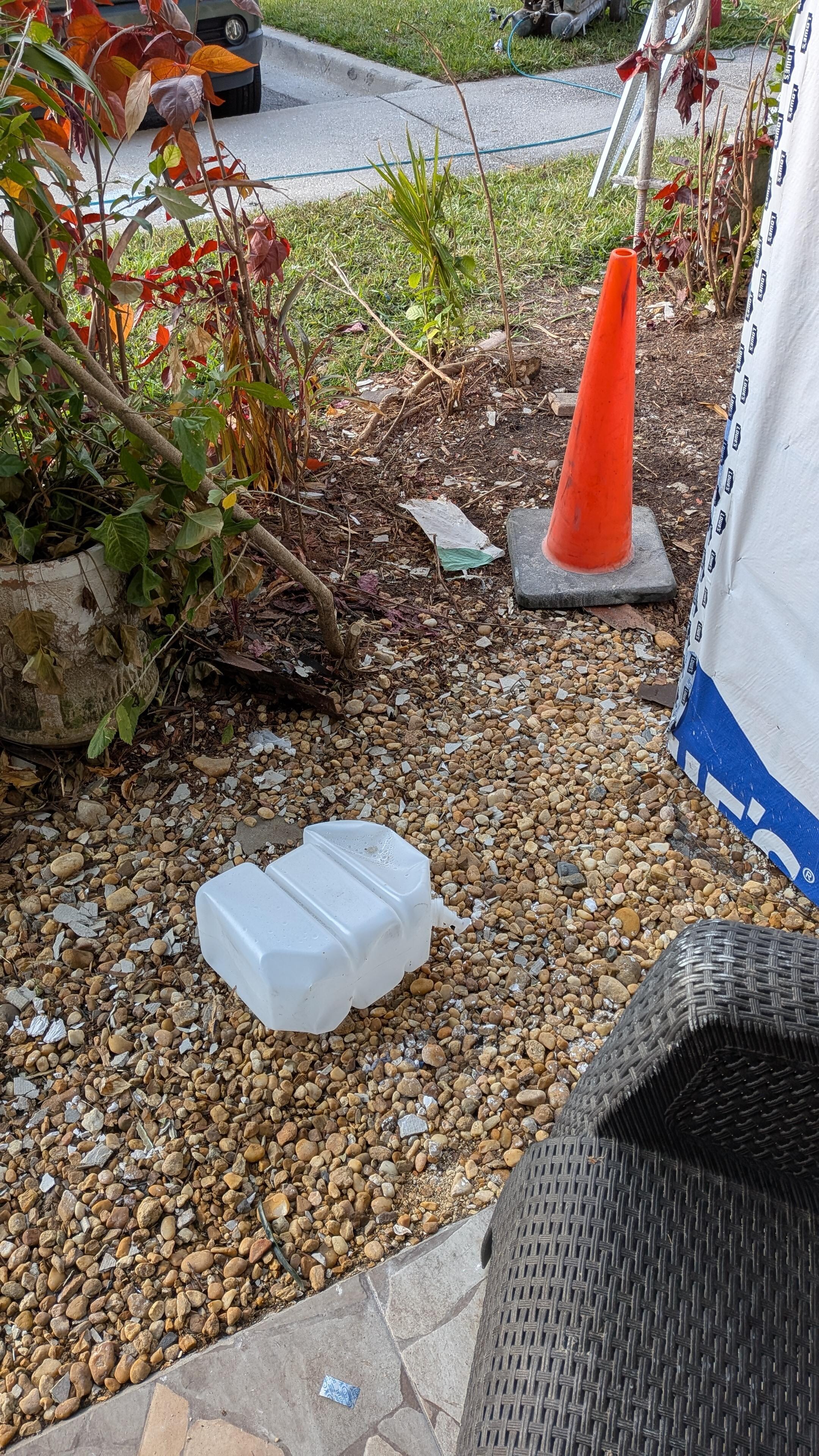 garbage and construction debris in the entryway/porch