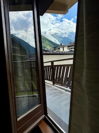 Door from living room out to balcony, beautiful Mont Blanc!