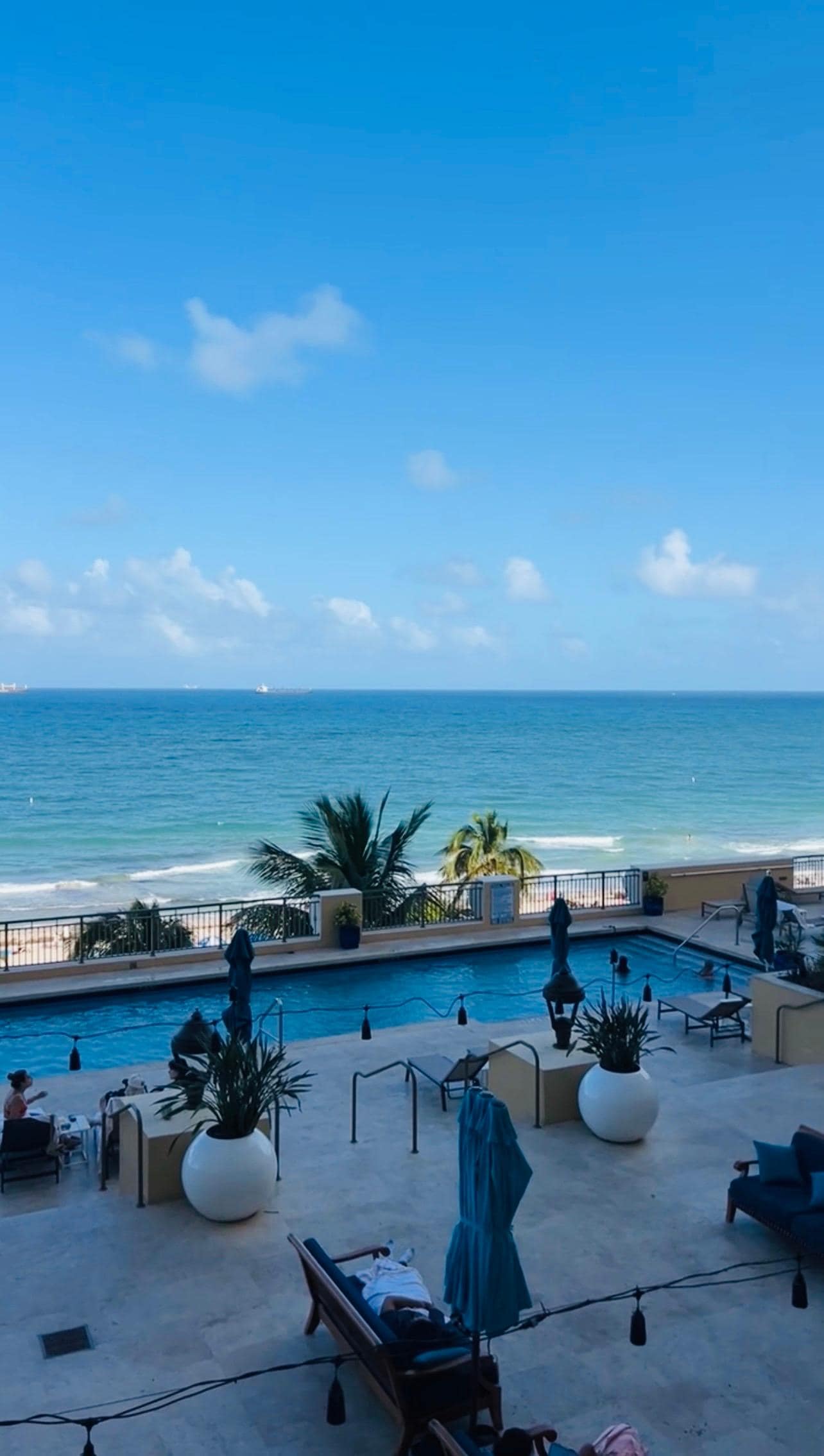 View overlooking the pool from the room balcony & the  ocean beyond! 