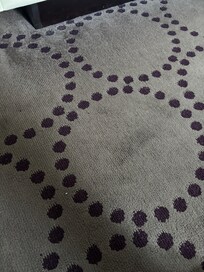 More dirt and lint beside bed