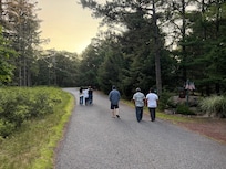 Going for a walk around the property.