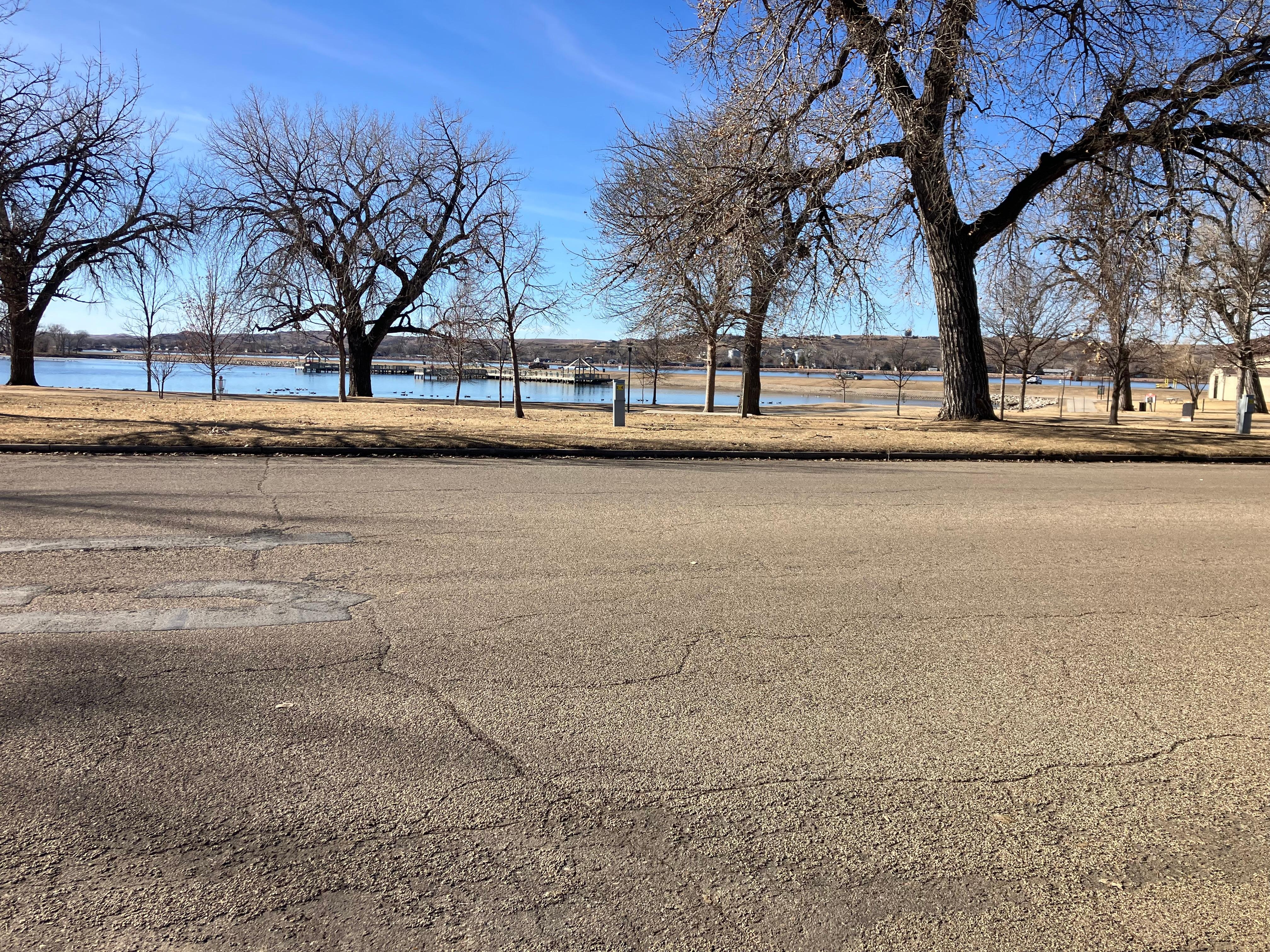 Park and River right across the street. Bike path is on the riverfront.