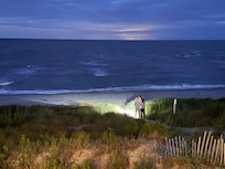 Kids going out to look for ghost crabs.