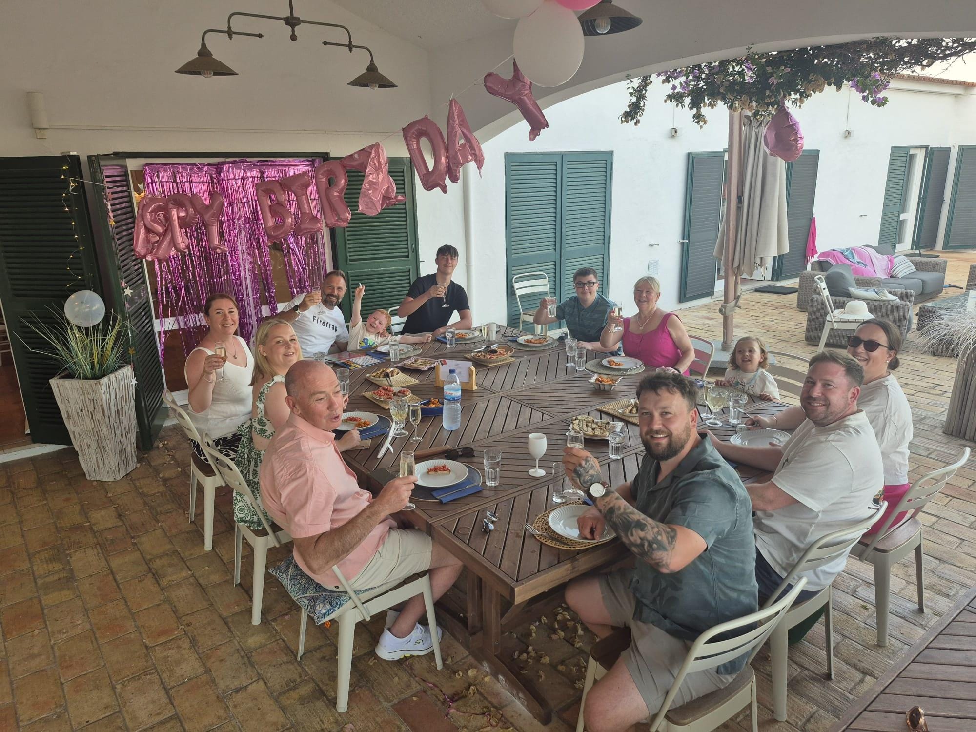 Family sitting down for evening meal 