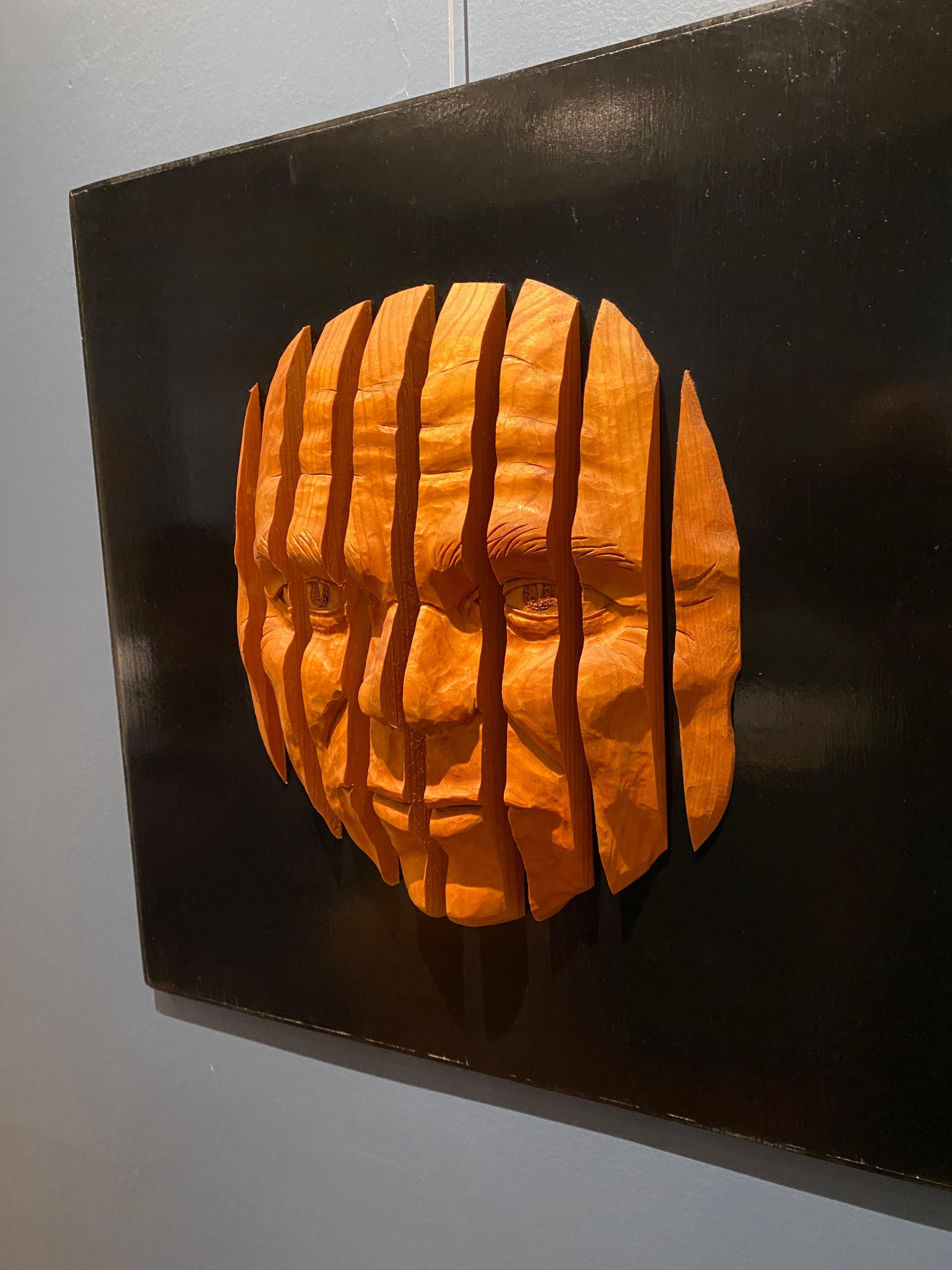 Prisoner arts, sculpture in pine called "Fragmentation"