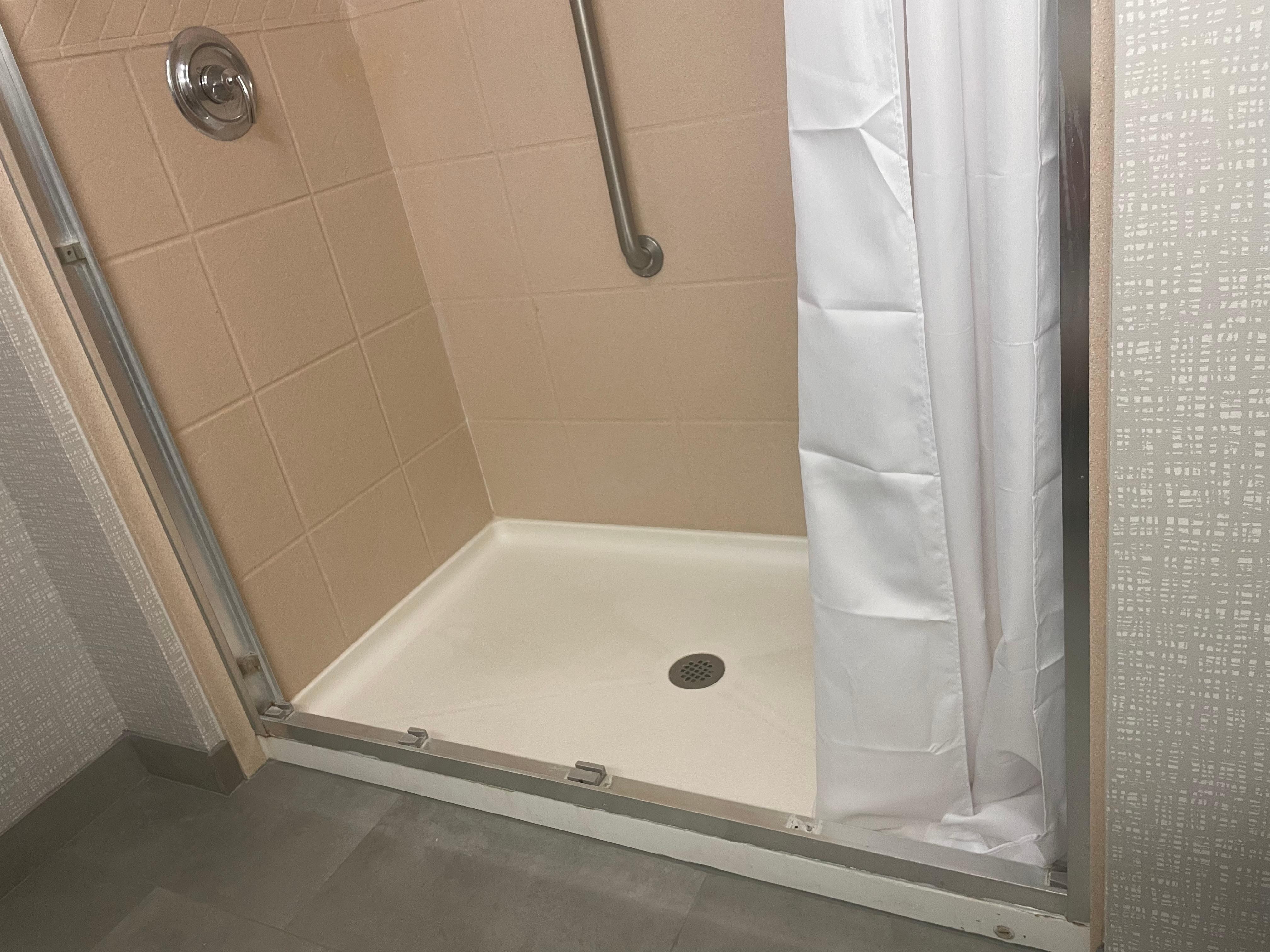 Door removed poorly fitting shower curtain added