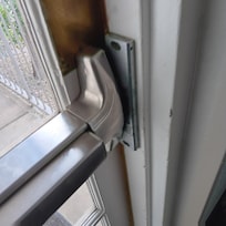 Door led outside didn't latch. Free entry to anyone.