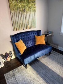 We LOVED this seating area when the sun was starting to set and shining through the stained glass window