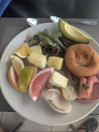 Delicious buffet breakfast with pool and beach views.