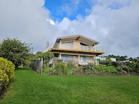 The house looking up from the pathway to the beach. We stayed in the flat on the ground floor.