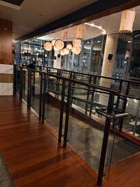 Walkway to restaurant inside the hotel.