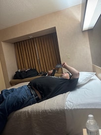 Son relaxing after delicious pizza!