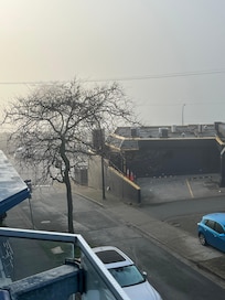 Last morning fog from balcony looking over the bay.