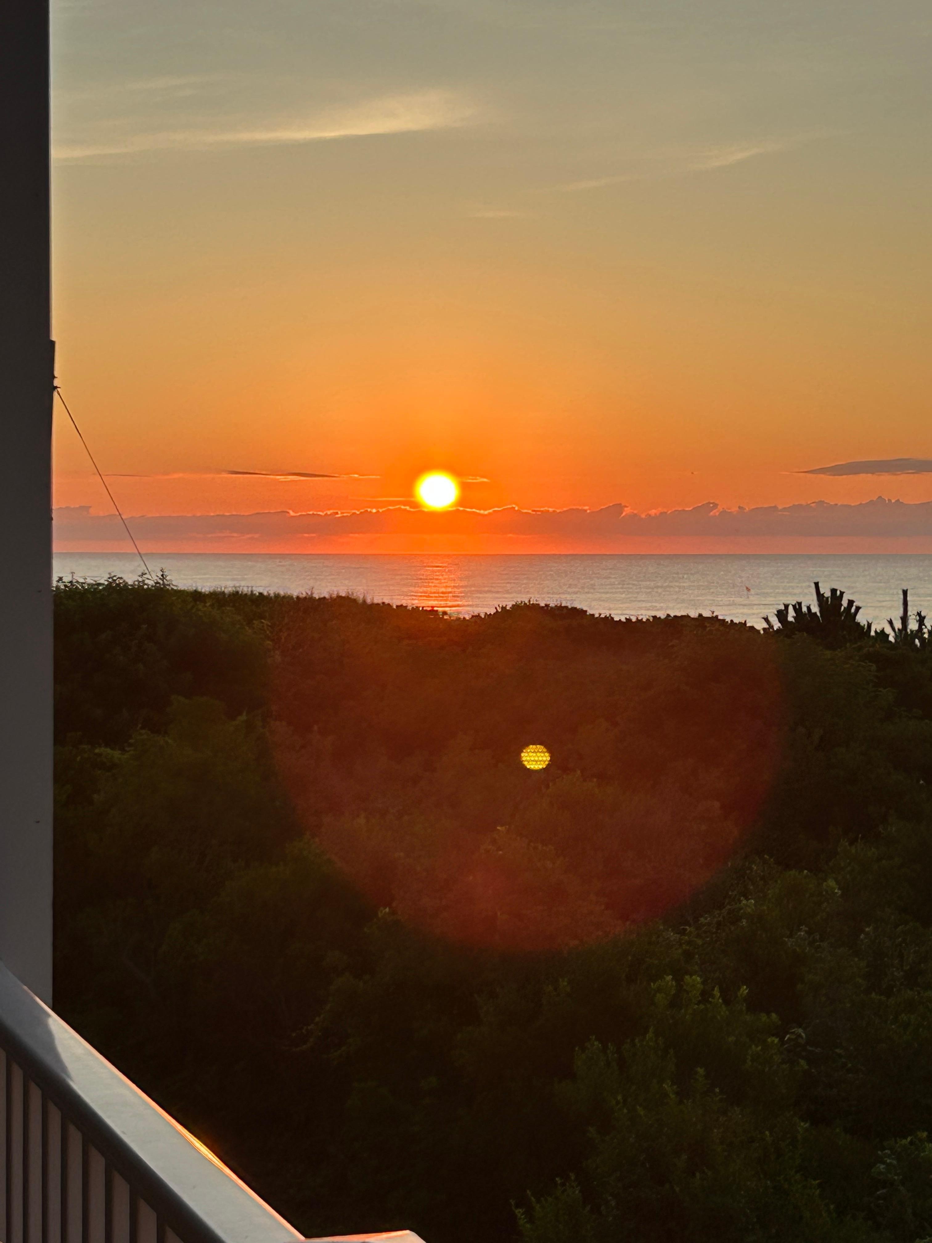 Sunrise from master bedroom suite.