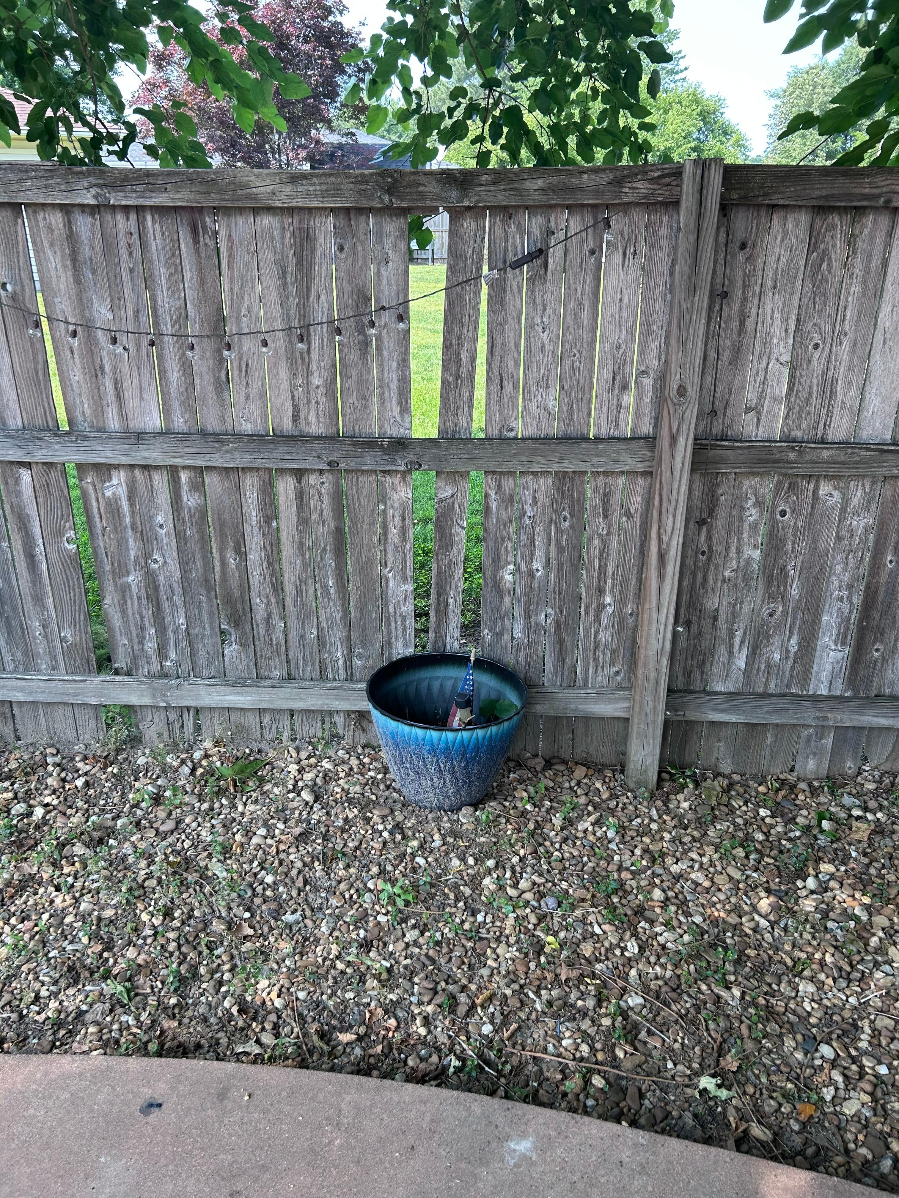 Fence falling apart- child can squeeze thru 