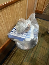 Hallways with garbage and linen stayed in the hallway overnight, still there the next morning.