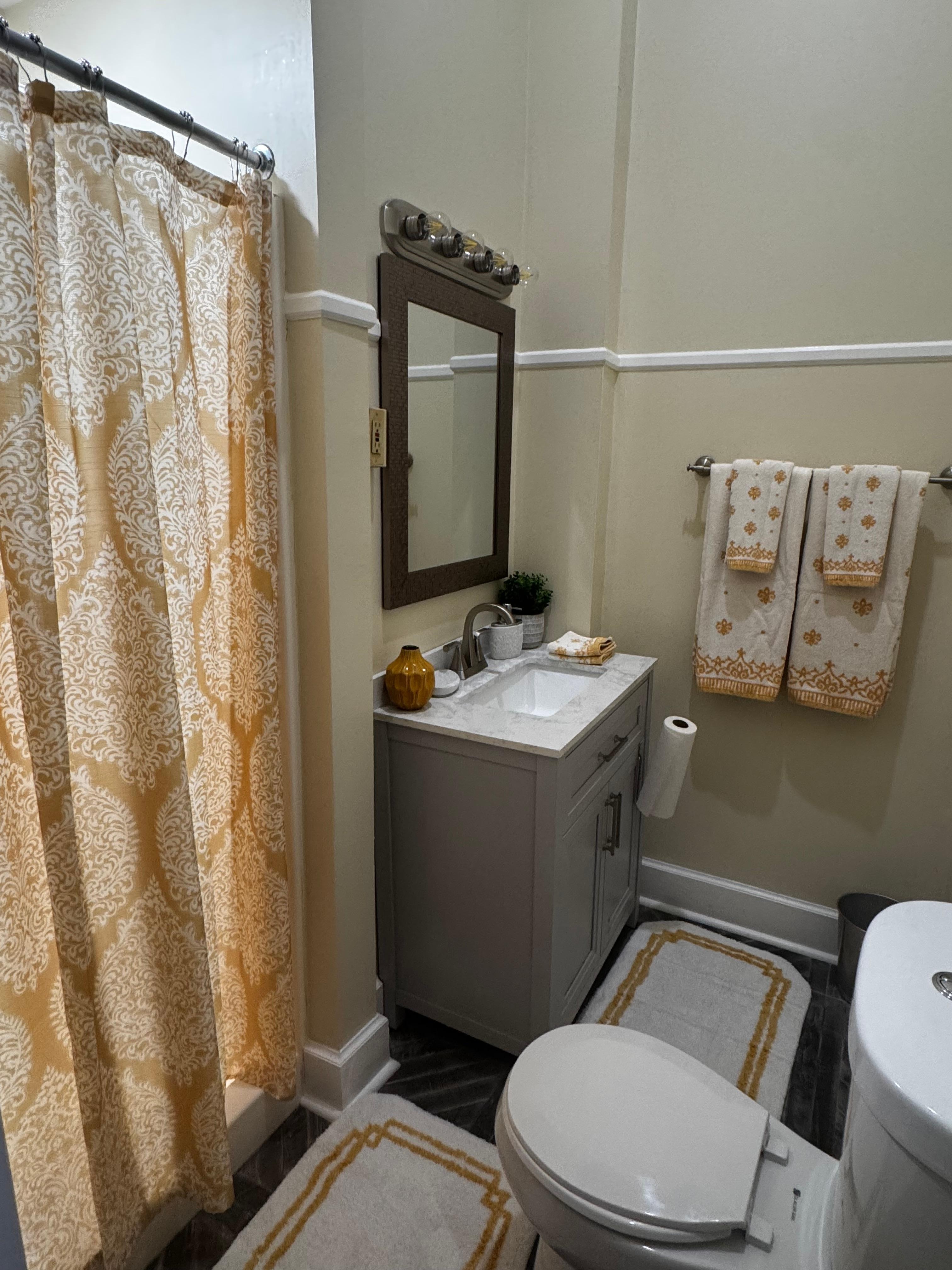 Bathroom with a walk in shower. 
